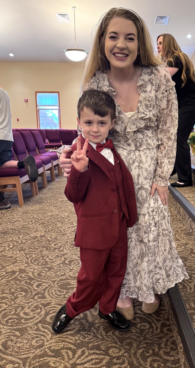 Madison with a student at a recital